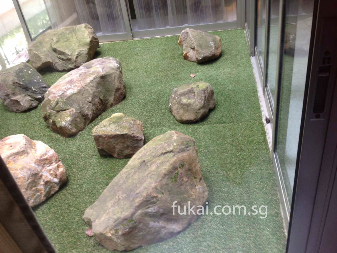 Artificial Grass With A Few Artistic Rocks 1