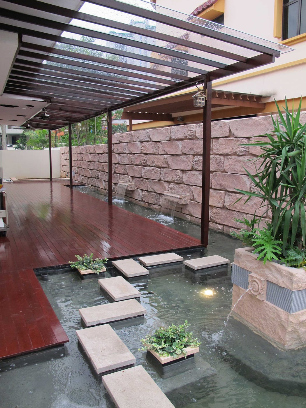Timber Decking Roof With Water Feature
